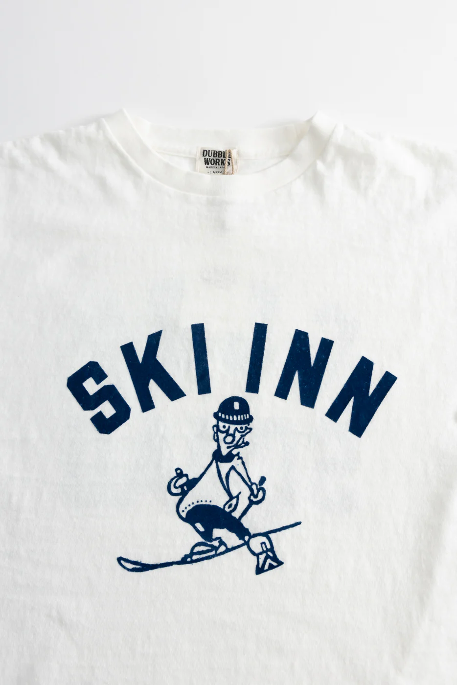 5.4oz - Raffy Tenjiku Printed T-Shirt "Ski Inn" - Off White - Image 2