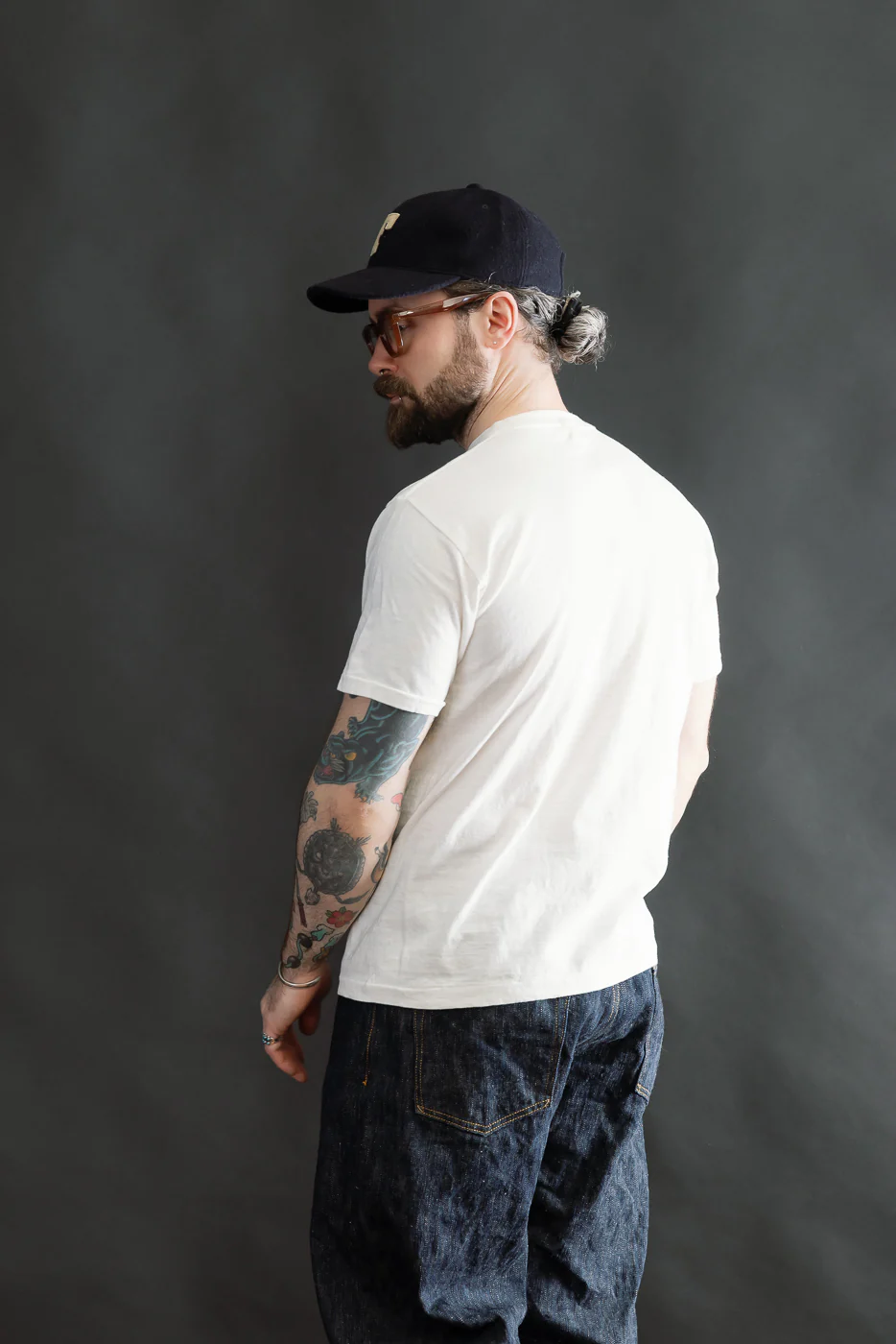 5.4oz - Raffy Tenjiku Printed T-Shirt "The Pet Rock" - Off White - Image 10