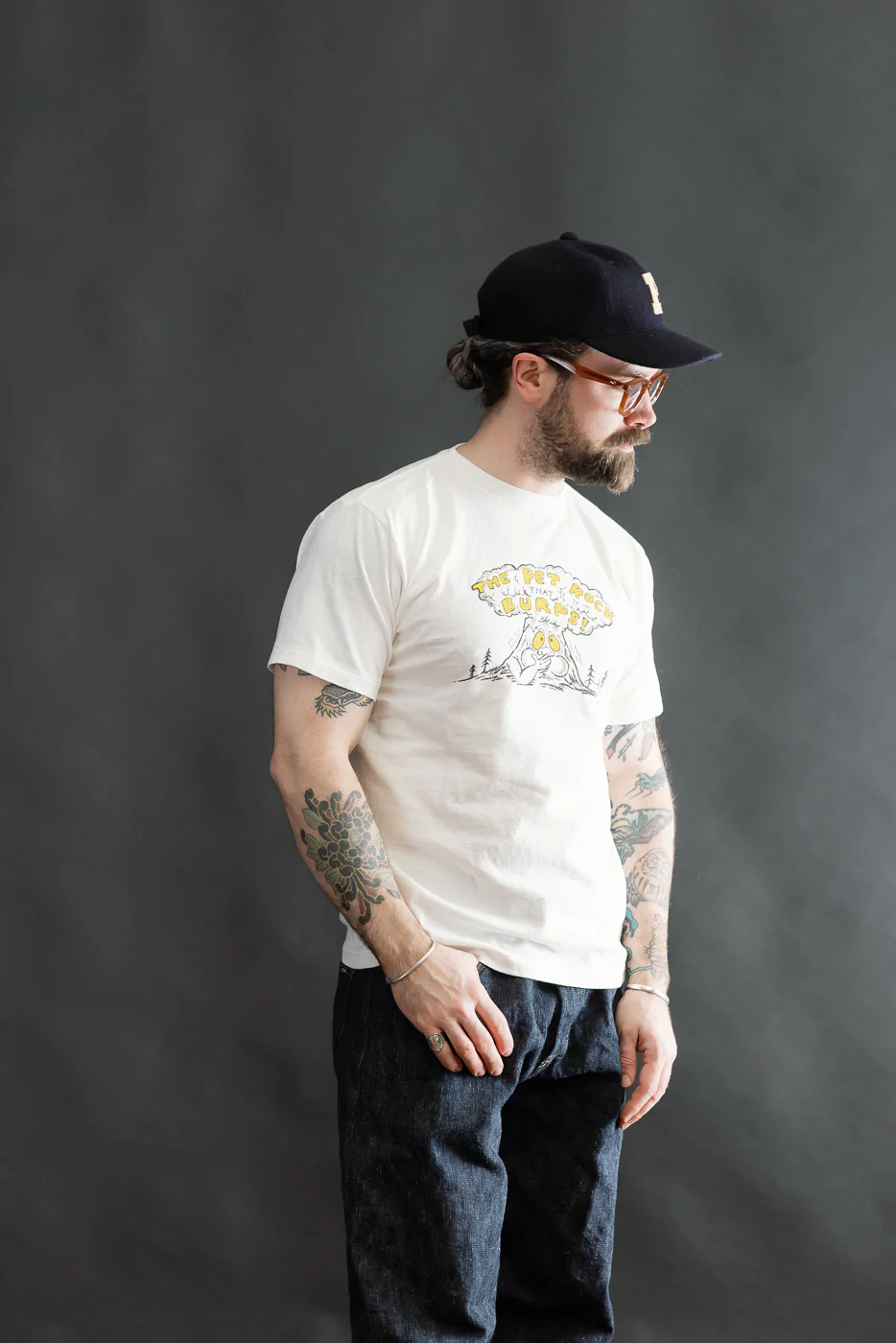 5.4oz - Raffy Tenjiku Printed T-Shirt "The Pet Rock" - Off White - Image 13