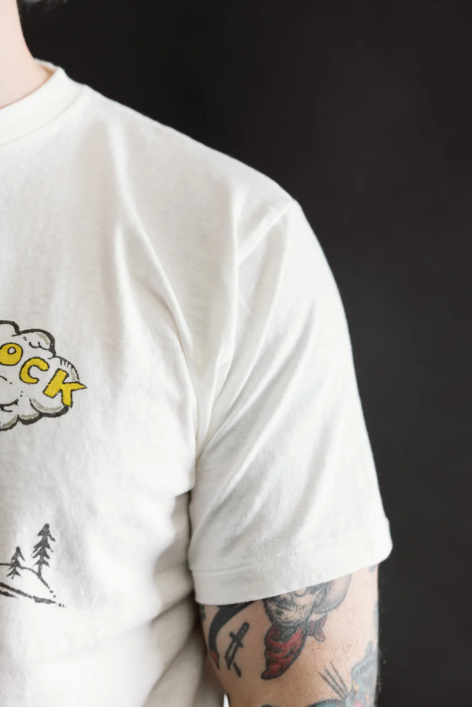 5.4oz - Raffy Tenjiku Printed T-Shirt "The Pet Rock" - Off White - Image 16